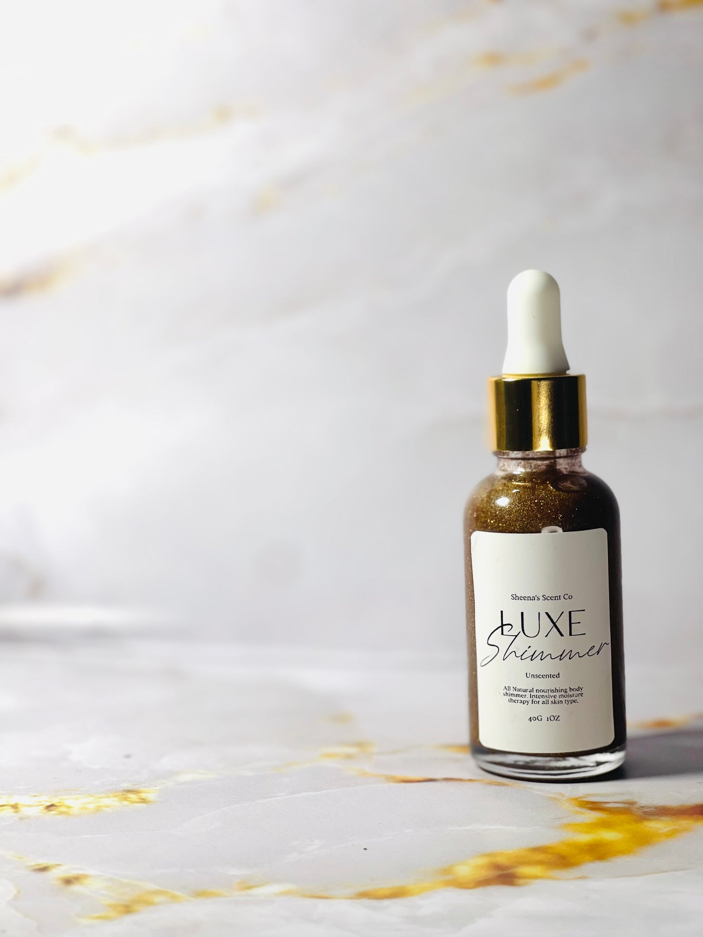 Bring your style to life with body shimmer, infused with light-reflecting particles to create a glamorously shiny finish that lasts for up to 8 hours. Our unique formula is enriched with nourishing in fractionated coconut oil and vitamin e oil to gently hydrate skin and minimize the appearance of imperfections as it adds a subtle glow to your skin’s natural beauty. We have three different shades with different undertones. 1oz jars