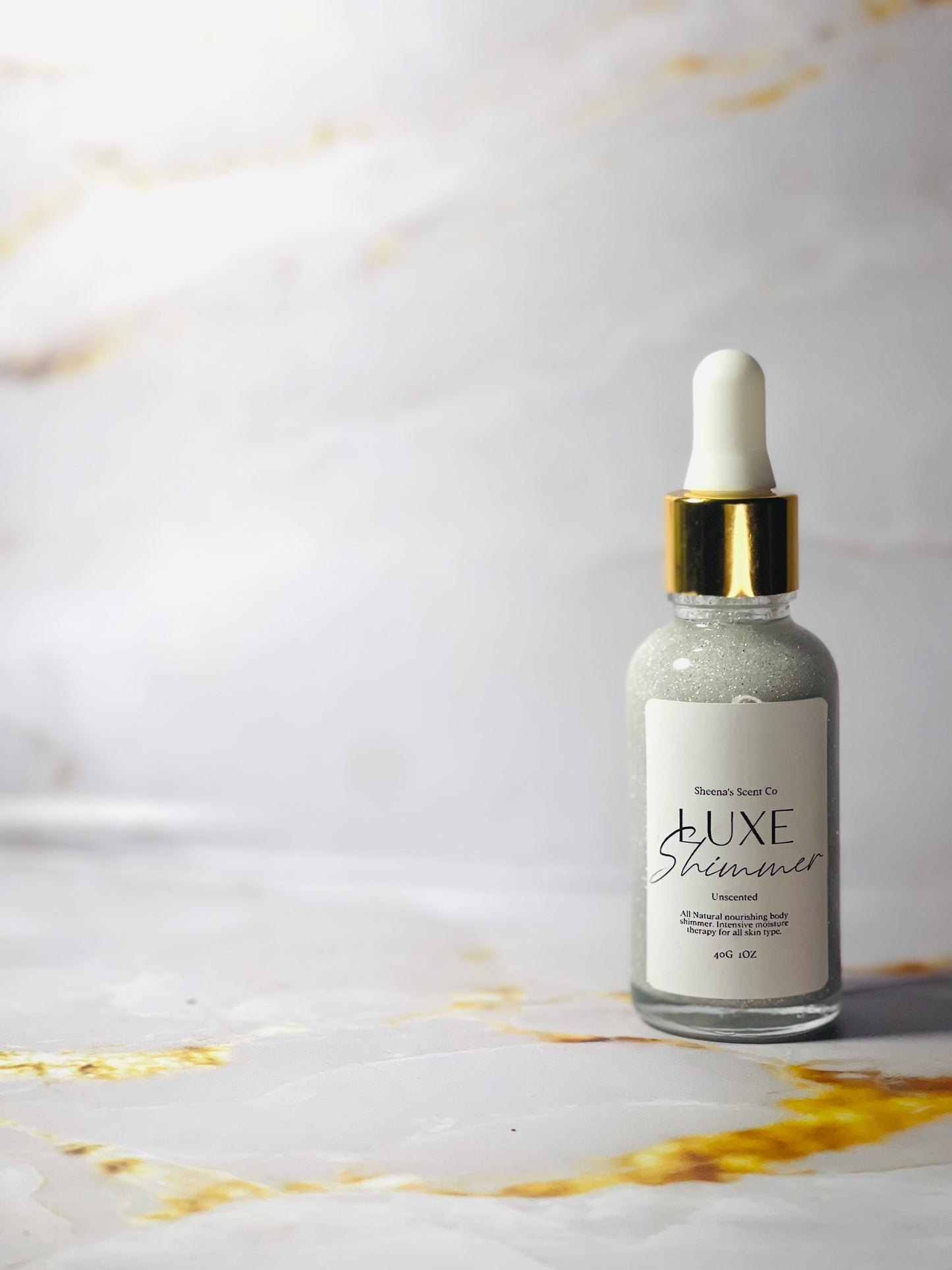 Bring your style to life with body shimmer, infused with light-reflecting particles to create a glamorously shiny finish that lasts for up to 8 hours. Our unique formula is enriched with nourishing in fractionated coconut oil and vitamin e oil to gently hydrate skin and minimize the appearance of imperfections as it adds a subtle glow to your skin’s natural beauty. We have three different shades with different undertones. 1oz jars